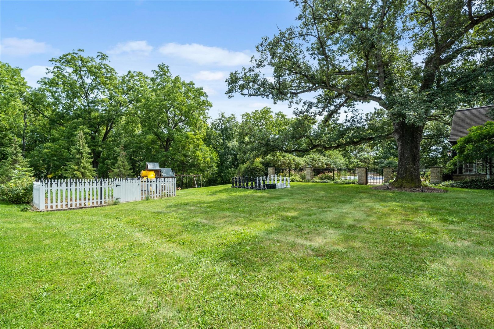 37-w025 Crane Road St. Charles, IL 60174 - Photo 26 of 32 a view of a park with a house in the background