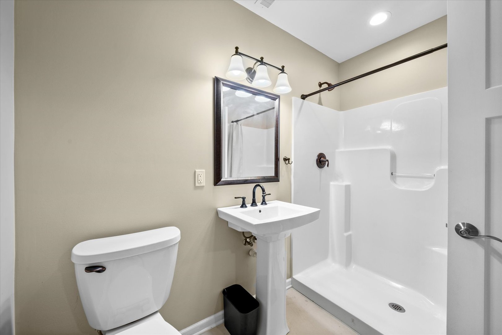 37-w025 Crane Road St. Charles, IL 60174 - Photo 32 of 32 a bathroom with a sink mirror toilet and shower