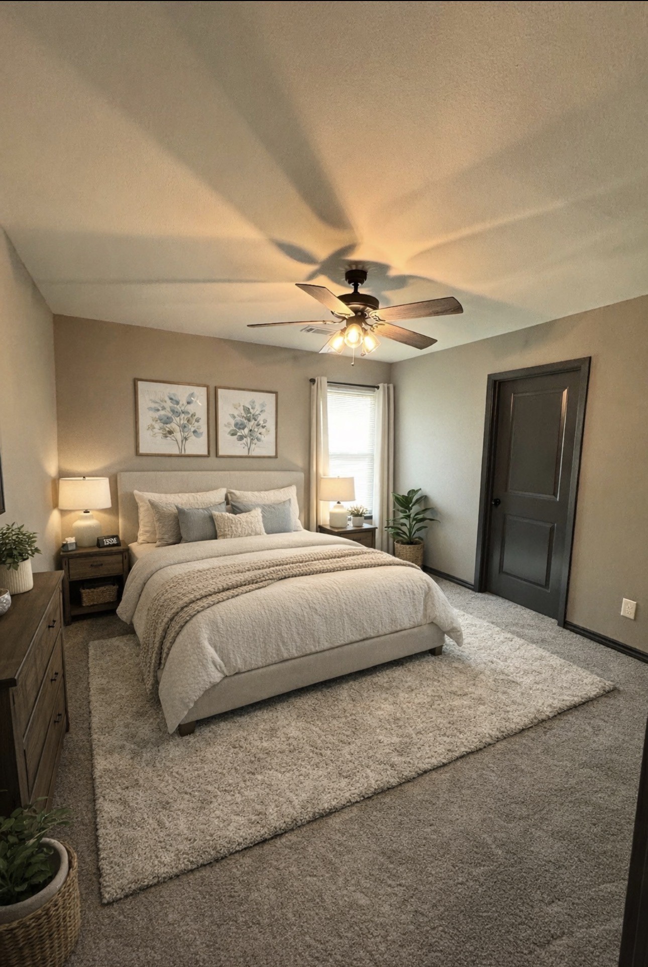 7906 Sexton Street Houston, TX 77028 - Photo 18 of 20 a bedroom with a large bed and a chandelier