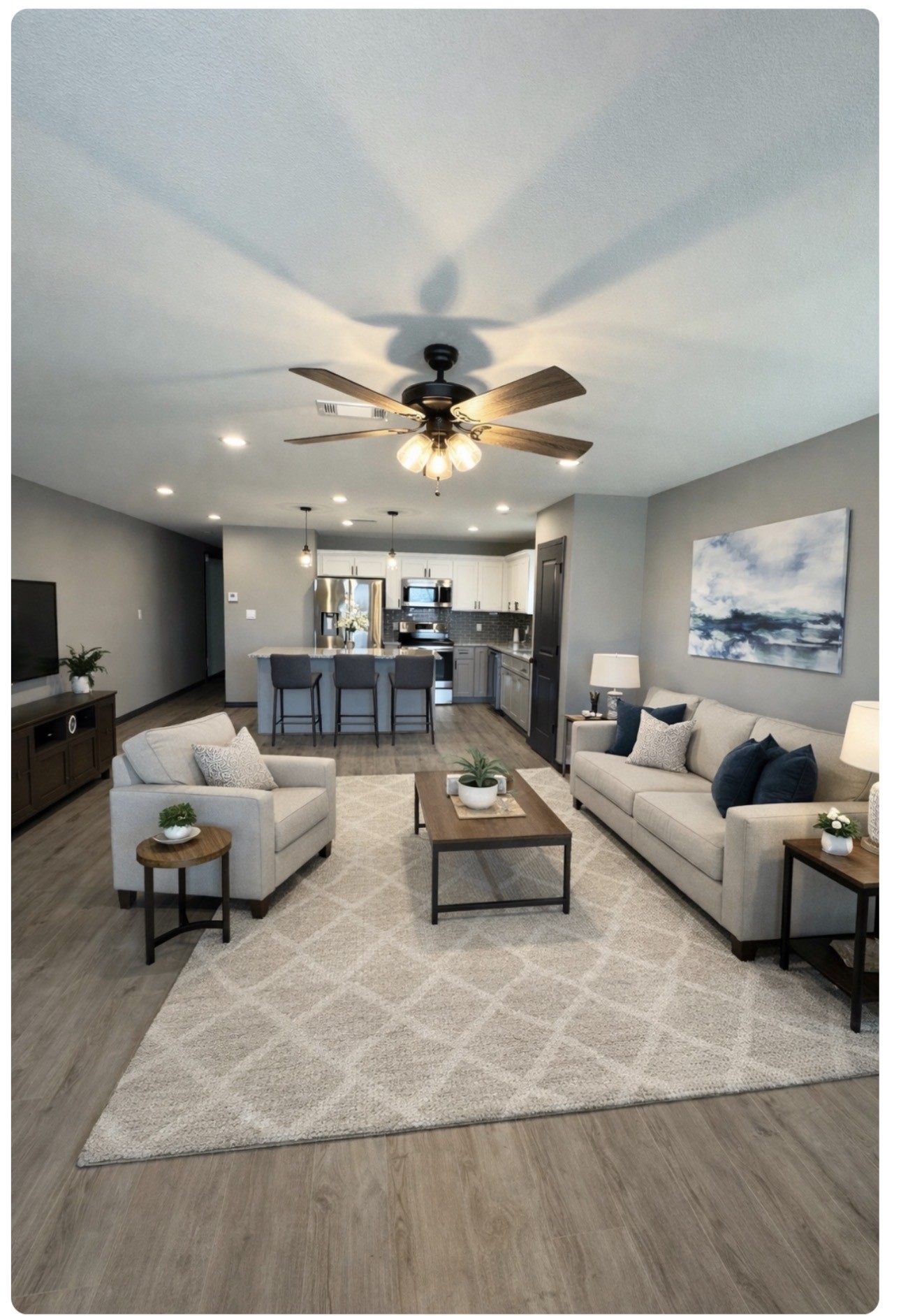 7906 Sexton Street Houston, TX 77028 - Photo 3 of 20 a living room with furniture and a chandelier