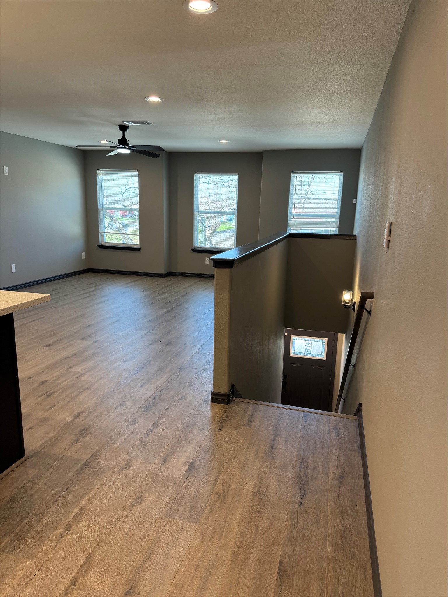 7906 Sexton Street Houston, TX 77028 - Photo 10 of 20 wooden floor in an empty room with a window