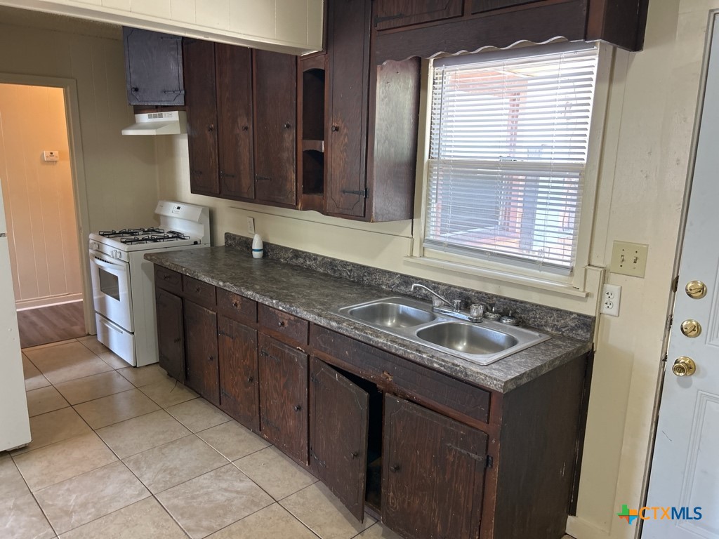 715 Cardinal Avenue Killeen, TX 76541 - Photo 6 of 12 a bathroom with a sink and a mirror