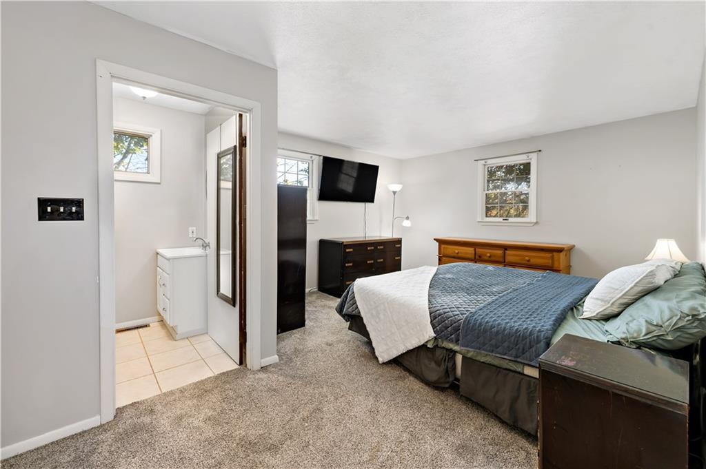 155 Brickyard Road Mars, PA 16046 - Photo 13 of 33 a bedroom with a bed and a television