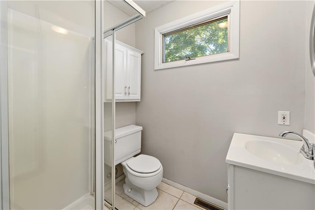 155 Brickyard Road Mars, PA 16046 - Photo 15 of 33 a bathroom with a toilet a sink and a window