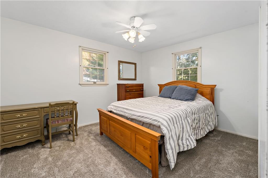 155 Brickyard Road Mars, PA 16046 - Photo 18 of 33 a bedroom with a bed and a chandelier