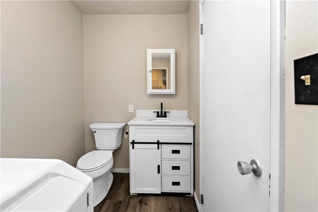 155 Brickyard Road Mars, PA 16046 - Photo 23 of 33 a bathroom with a toilet sink and mirror