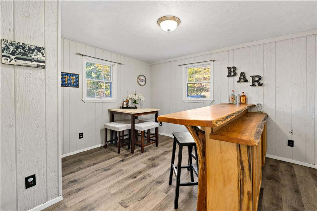 155 Brickyard Road Mars, PA 16046 - Photo 10 of 33 a view of a dining room with furniture and wooden floor