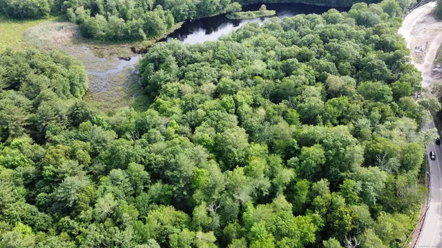 an aerial view of residential house with outdoor space