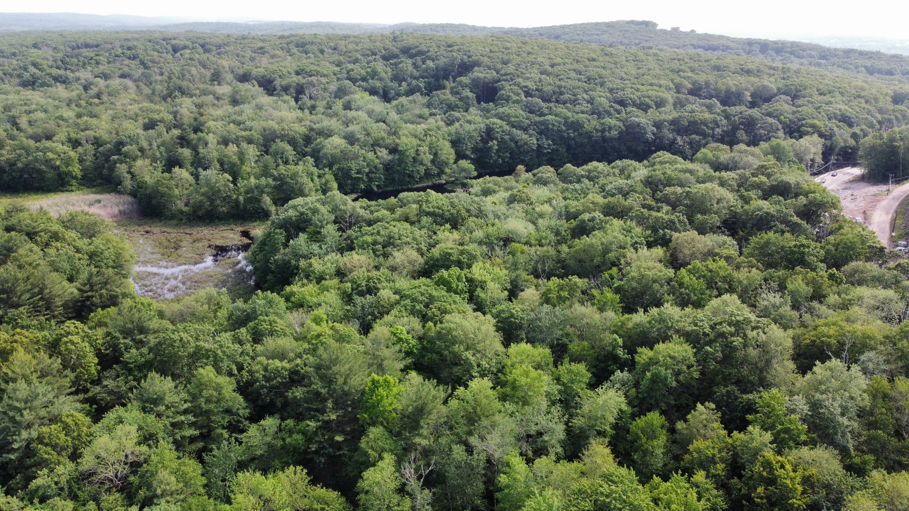 178 Crystal Lake Road Ellington, CT 06029 - Photo 19 of 27 an aerial view of a house with a yard