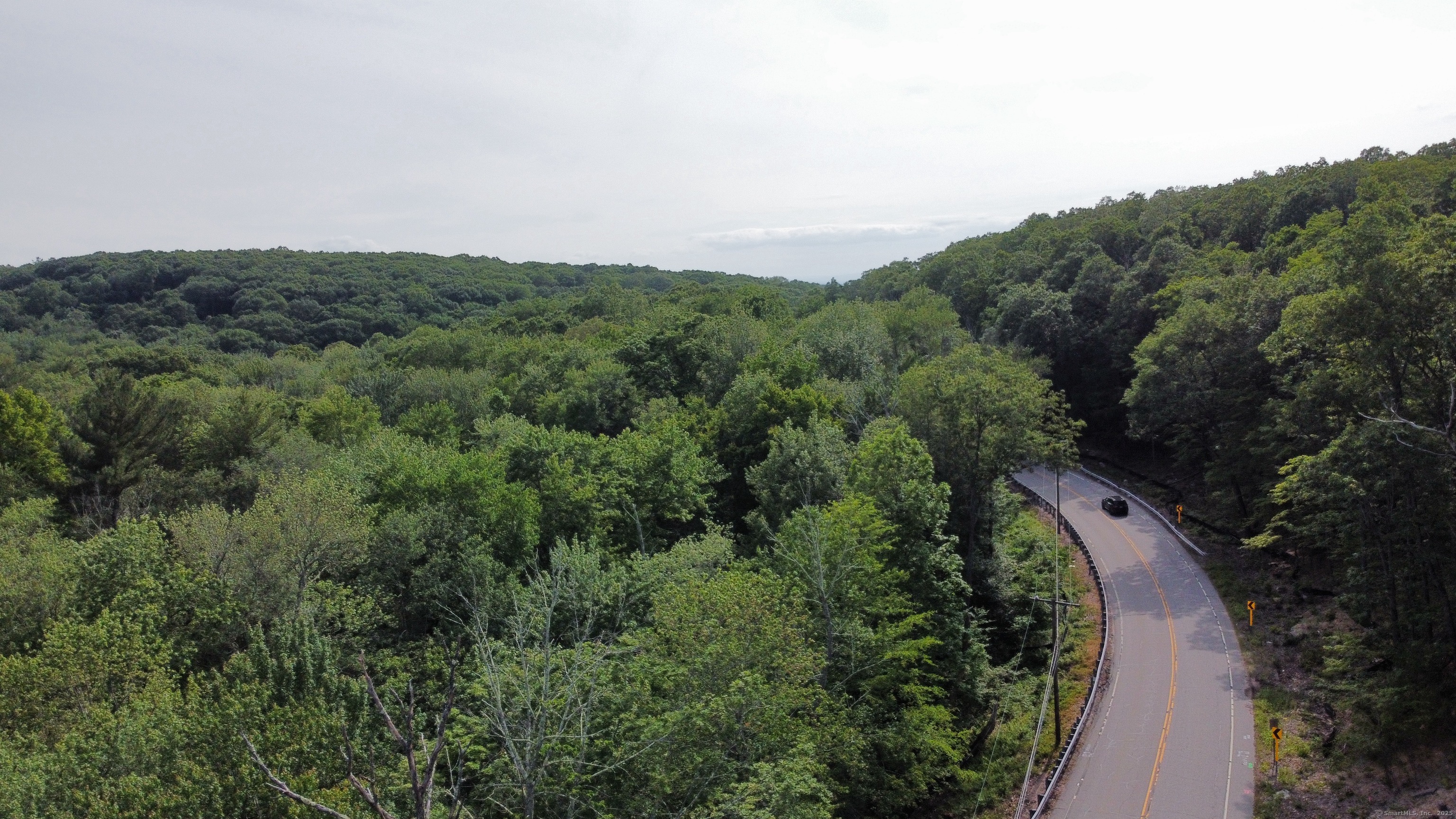178 Crystal Lake Road Ellington, CT 06029 - Photo 23 of 27 an aerial view of a house with mountain view