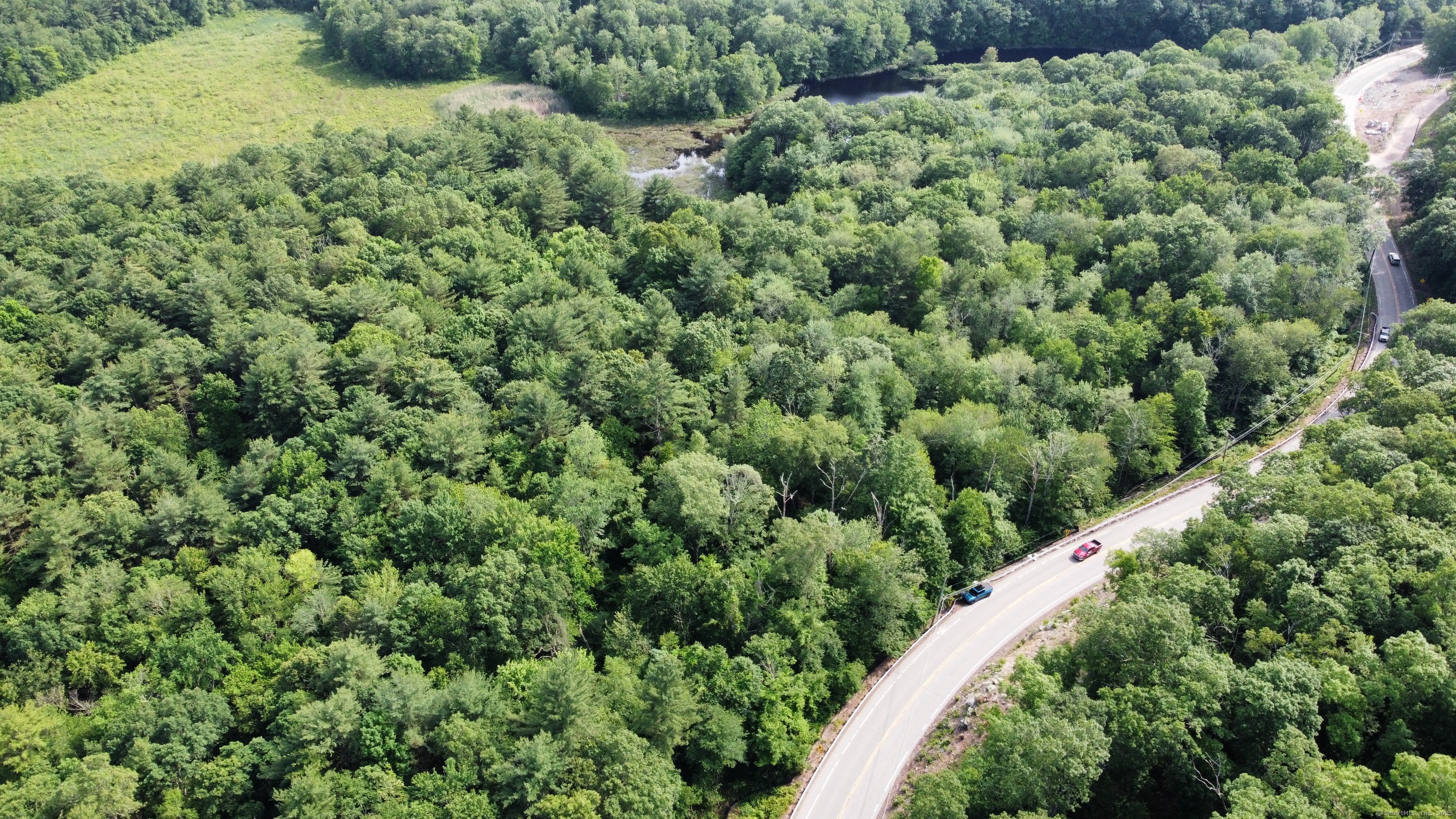 178 Crystal Lake Road Ellington, CT 06029 - Photo 5 of 27 an aerial view of a house with a yard