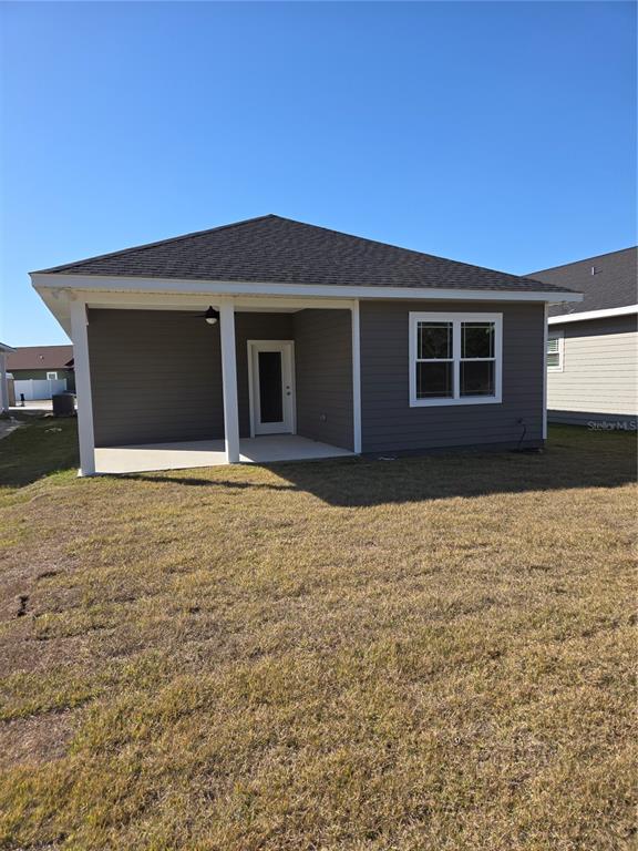 1761 Southwest 244th Way Newberry, FL 32669 - Photo 12 of 21 a house with yard