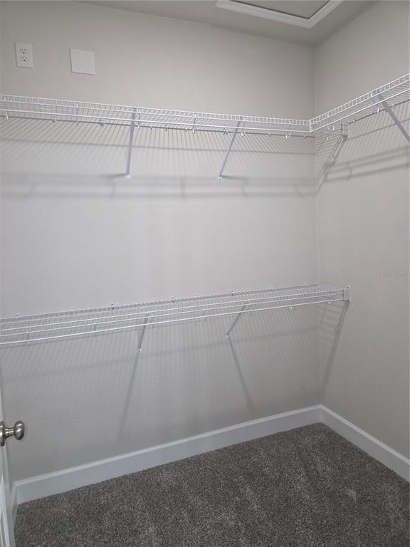 1761 Southwest 244th Way Newberry, FL 32669 - Photo 10 of 21 a view of a room with racks on the wall