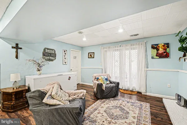 a bedroom with furniture and a bed