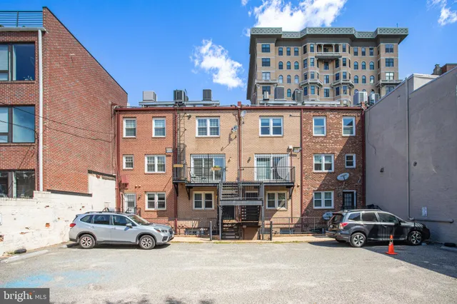 a car parked in front of a building
