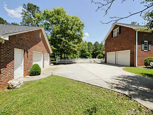 9922 Mini Ranch Road Waxhaw, NC 28173 - Photo 3 of 16 a view of a house with a yard