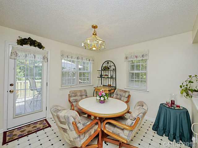 9922 Mini Ranch Road Waxhaw, NC 28173 - Photo 7 of 16 a view of a dining room with furniture window and outside view