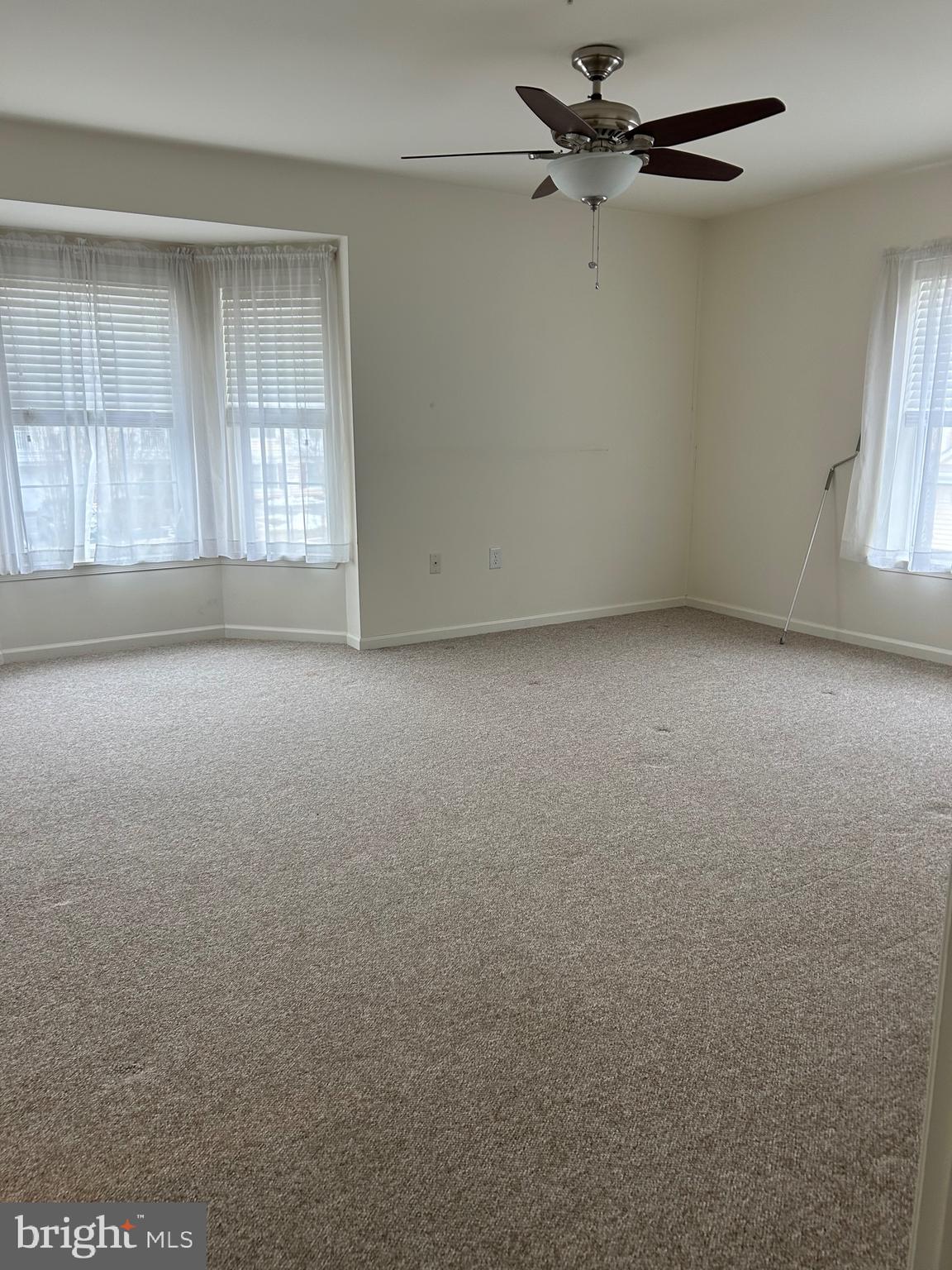 1201 Independence Way Newark, DE 19713 - Photo 16 of 24 an empty room with windows and fan