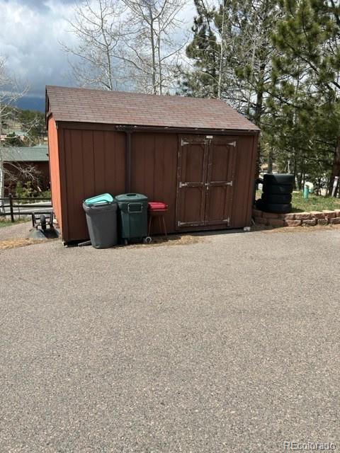 641 County Road 72 Bailey, CO 80421 - Photo 8 of 10 a house view with a outdoor space