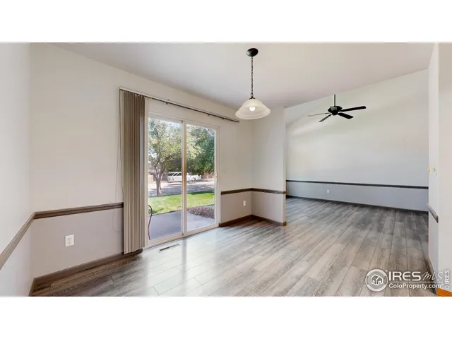 a open hall with a wooden floor