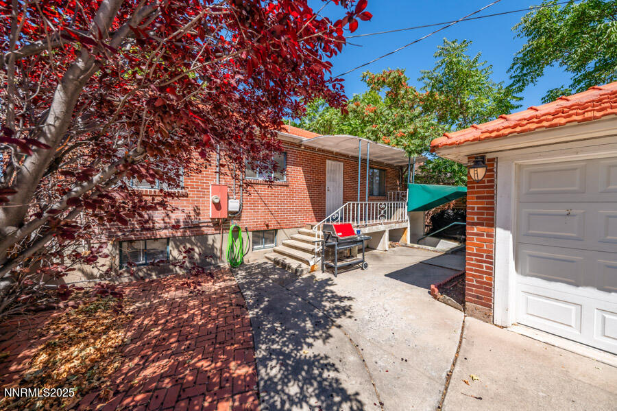 680 Edelweiss Street Reno, NV 89502 - Photo 27 of 29 a view of a house with a backyard