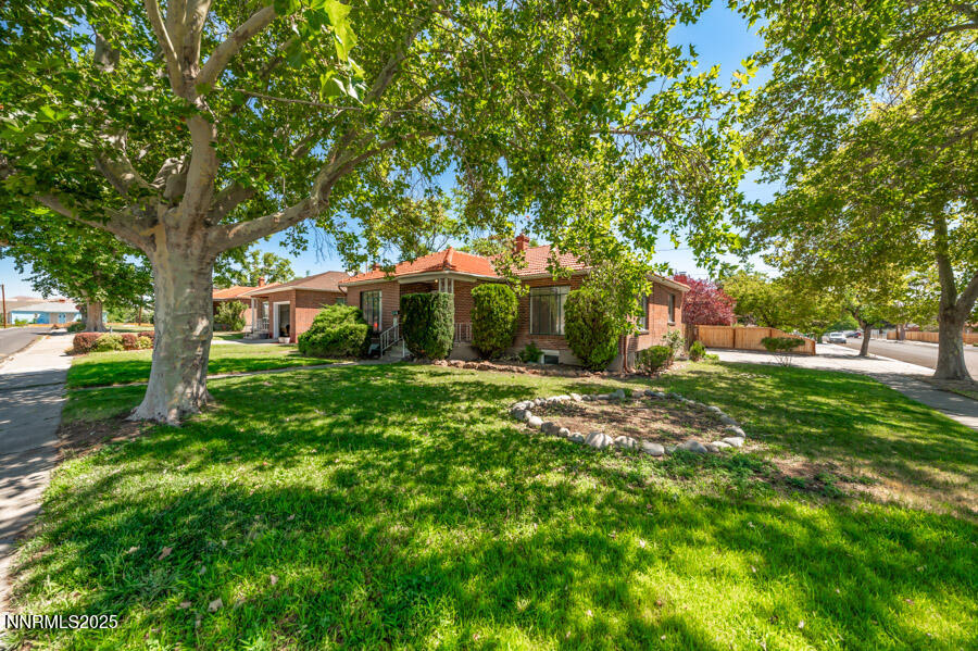 680 Edelweiss Street Reno, NV 89502 - Photo 29 of 29 a front view of a house with garden
