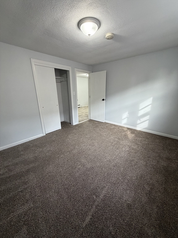 85 Trapelo Road, Unit 41 Waltham, MA 02452 - Photo 4 of 15 a view of empty room