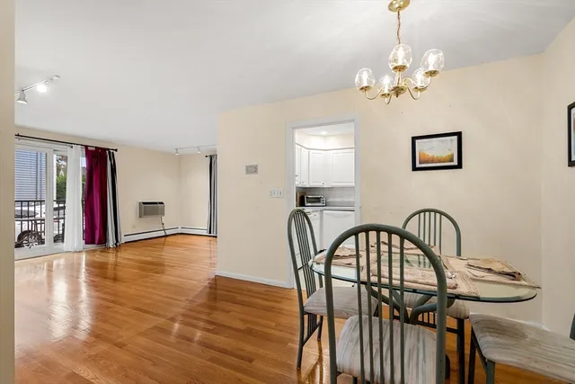 a view of a livingroom with furniture and wooden floor