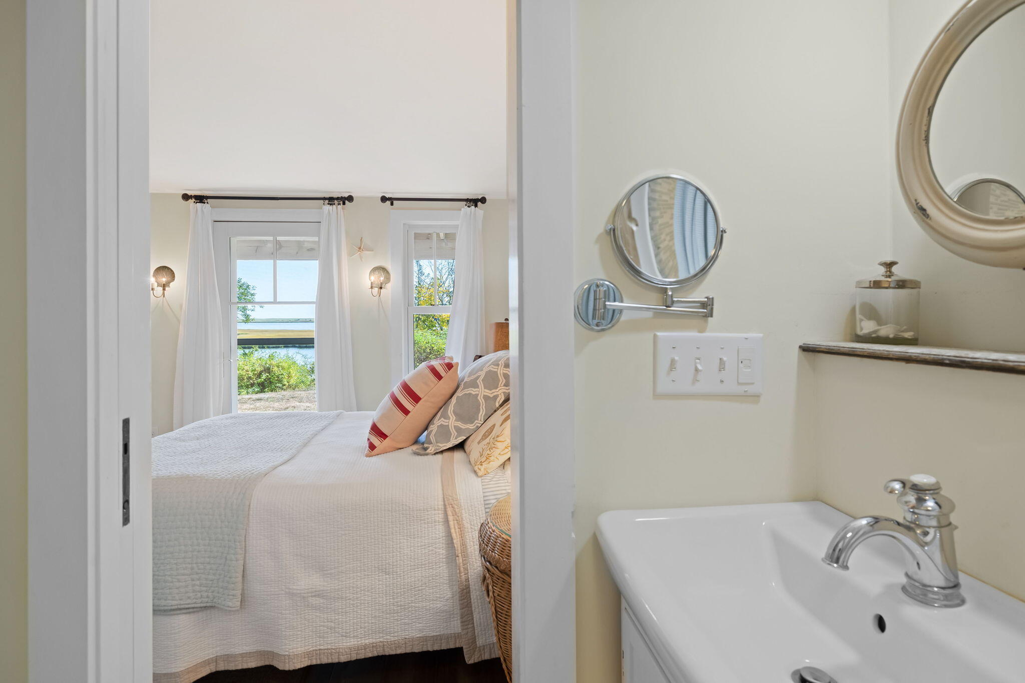 63 Briar Spring Road Orleans, MA 02653 - Photo 6 of 37 a bedroom with a bed and a bathroom