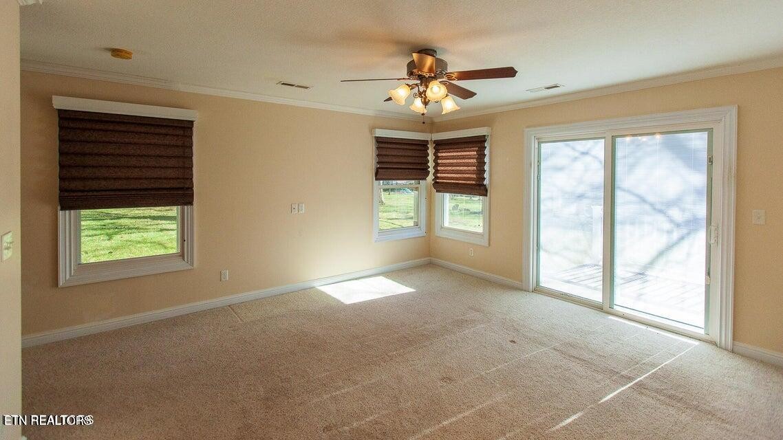 275 Hawthorn Loop Crossville, TN 38555 - Photo 22 of 59 a view of an empty room with a window