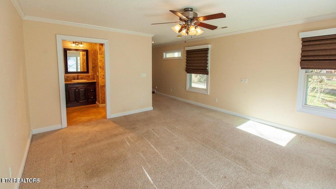 275 Hawthorn Loop Crossville, TN 38555 - Photo 23 of 59 a view of an empty room with a window