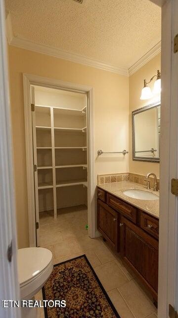 275 Hawthorn Loop Crossville, TN 38555 - Photo 31 of 59 a bathroom with a toilet a sink and a mirror