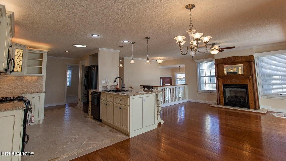 275 Hawthorn Loop Crossville, TN 38555 - Photo 41 of 59 a view of a kitchen with a sink stainless steel appliances and cabinets