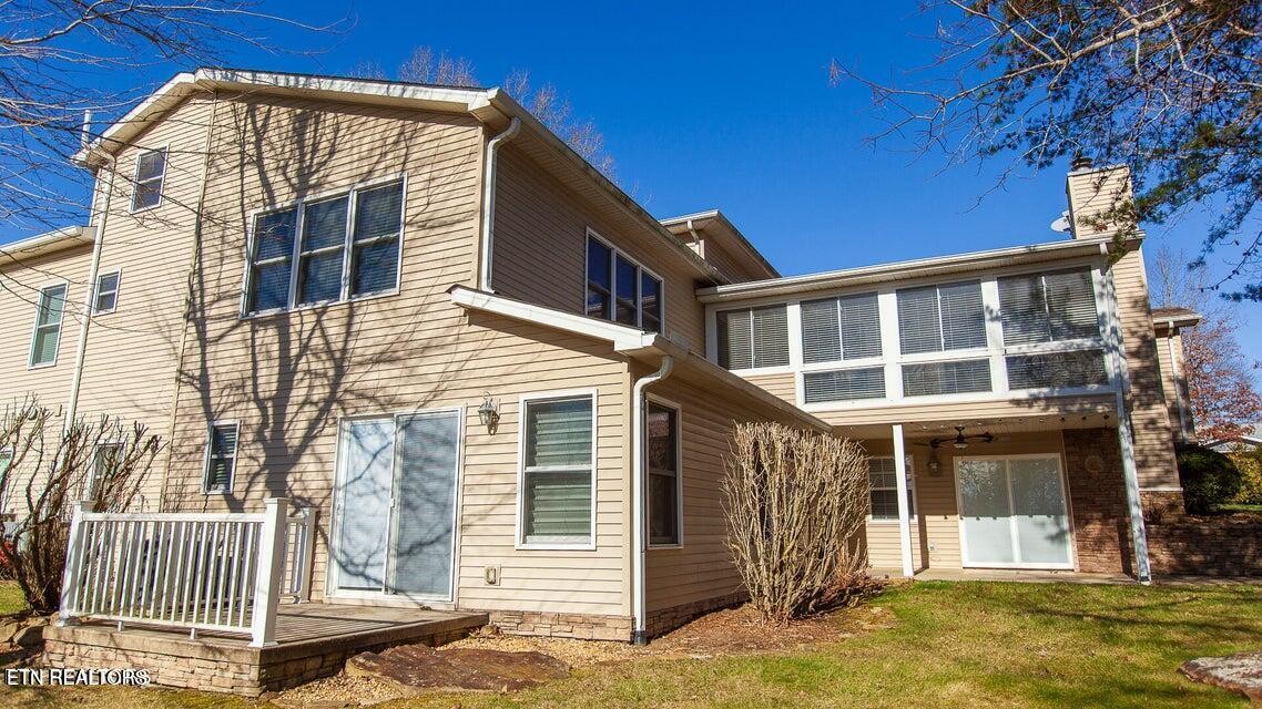 275 Hawthorn Loop Crossville, TN 38555 - Photo 6 of 59 a front view of a house with a yard