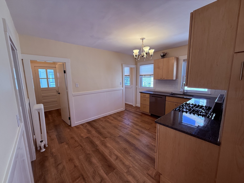 15 Chauncey Street, Unit 2 Watertown, MA 02472 - Photo 7 of 16 a view of a living room and dining room