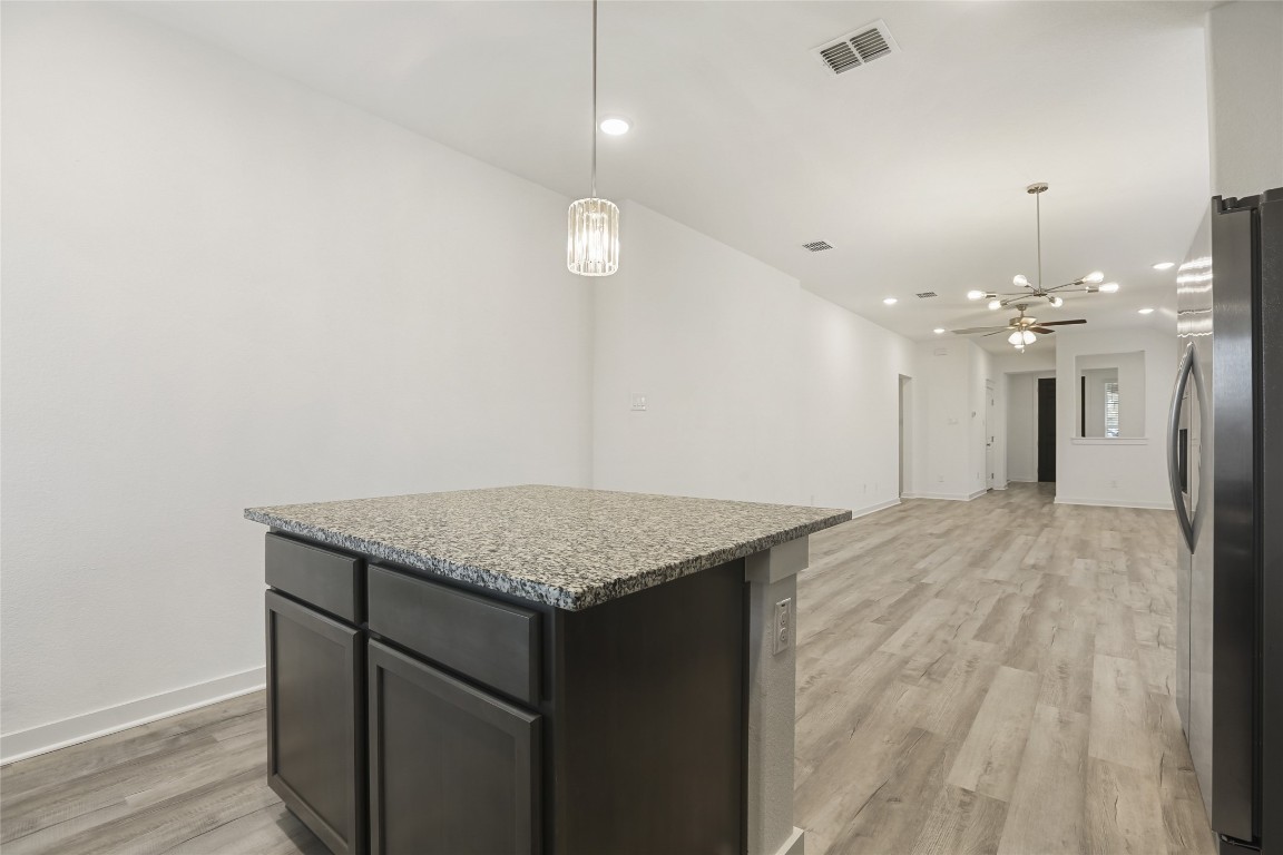 2340 Sawdust Drive Georgetown, TX 78633 - Photo 15 of 40 an empty room with wooden floor
