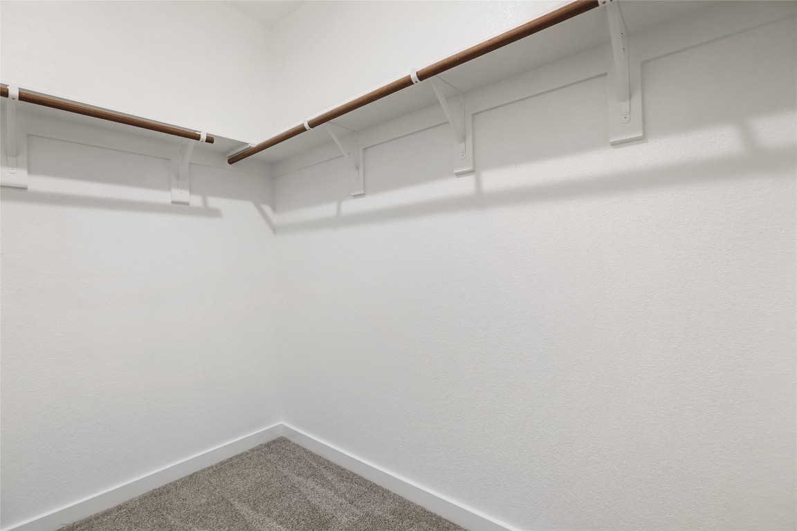2340 Sawdust Drive Georgetown, TX 78633 - Photo 22 of 40 a view of a room with shelf on the wall