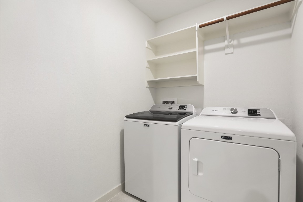 2340 Sawdust Drive Georgetown, TX 78633 - Photo 23 of 40 a utility room with dryer and washer