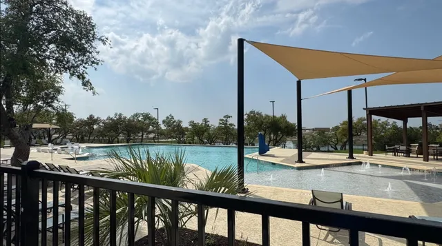 a view of a lake from a balcony
