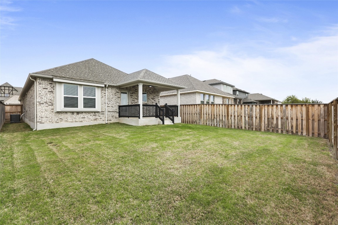 2340 Sawdust Drive Georgetown, TX 78633 - Photo 36 of 40 a view of a house with a yard and sitting area