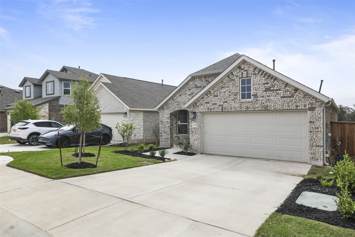 2340 Sawdust Drive Georgetown, TX 78633 - Photo 39 of 40 a front view of a house with a yard