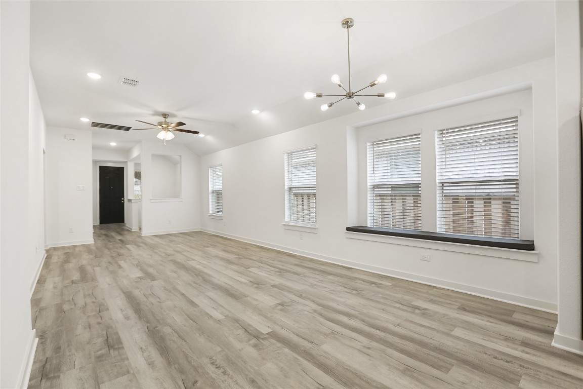 2340 Sawdust Drive Georgetown, TX 78633 - Photo 9 of 40 a view of an empty room with window and cabinet
