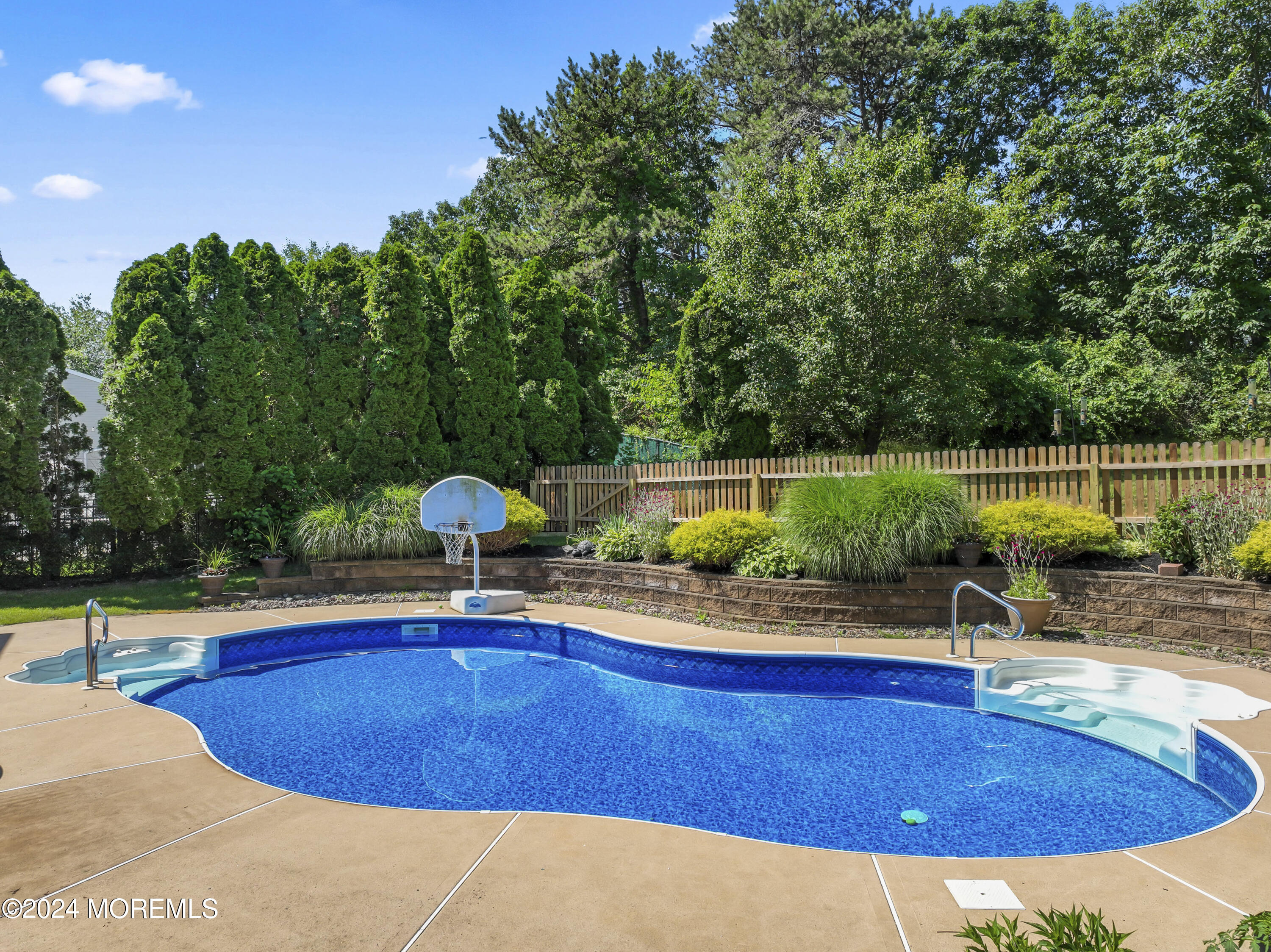 58 Lorelei Drive Howell, NJ 07731 - Photo 34 of 37 a view of a swimming pool with a patio