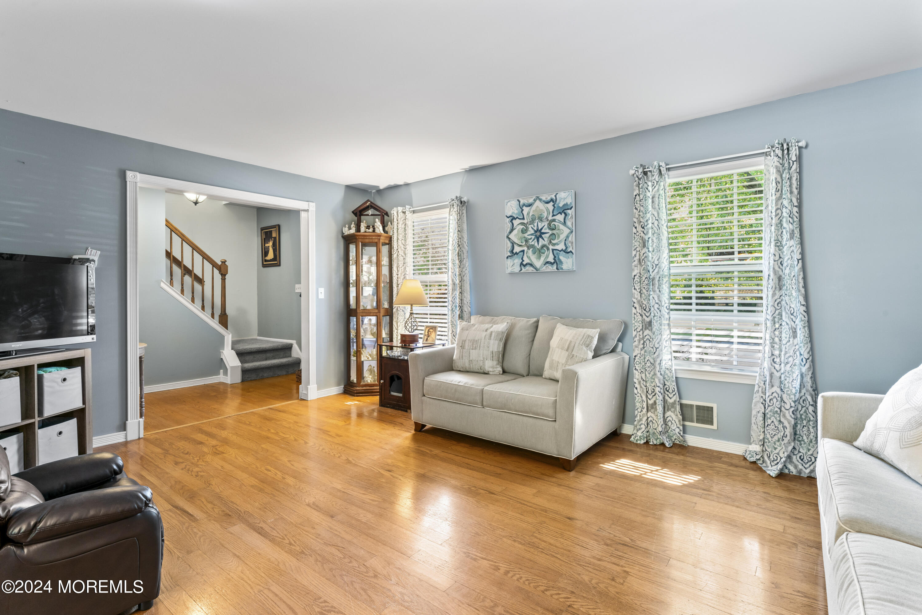 58 Lorelei Drive Howell, NJ 07731 - Photo 5 of 37 a living room with furniture and a flat screen tv