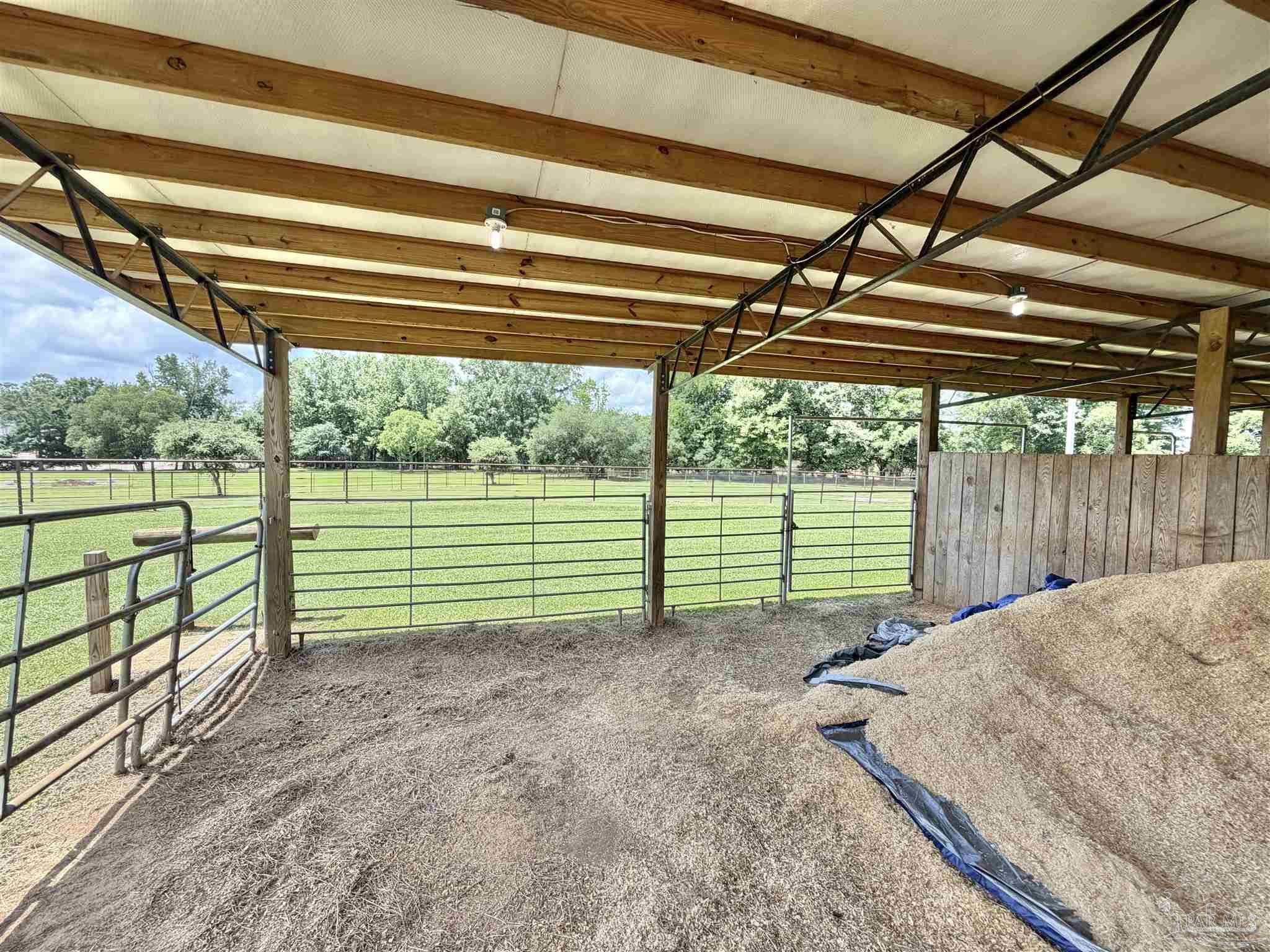 145 Tower Road Uriah, AL 36480 - Photo 37 of 72 a view of a backyard with wooden fence