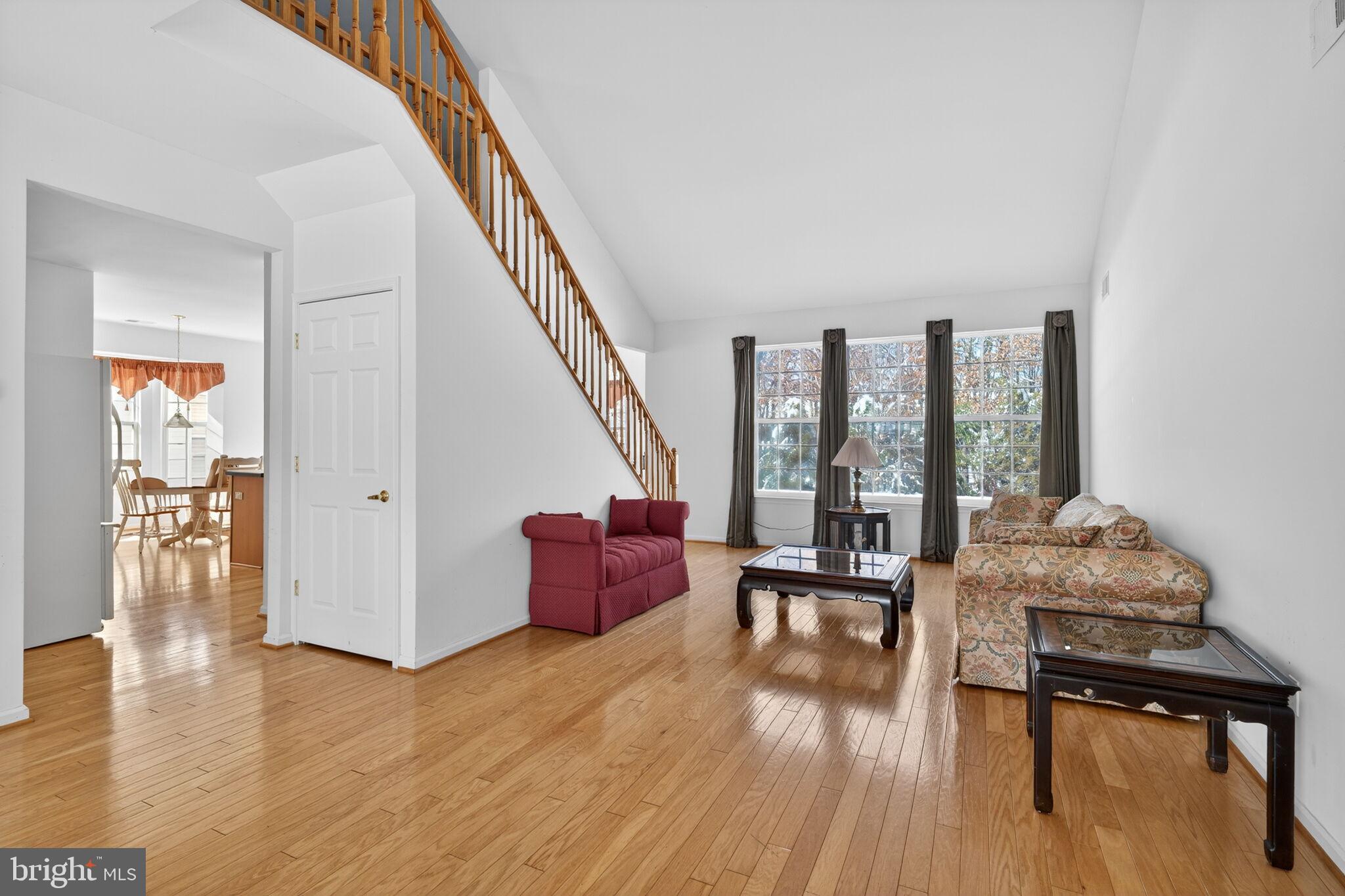 76 Portland Street Barnegat, NJ 08005 - Photo 13 of 47 a livingroom with furniture wooden floor and windows