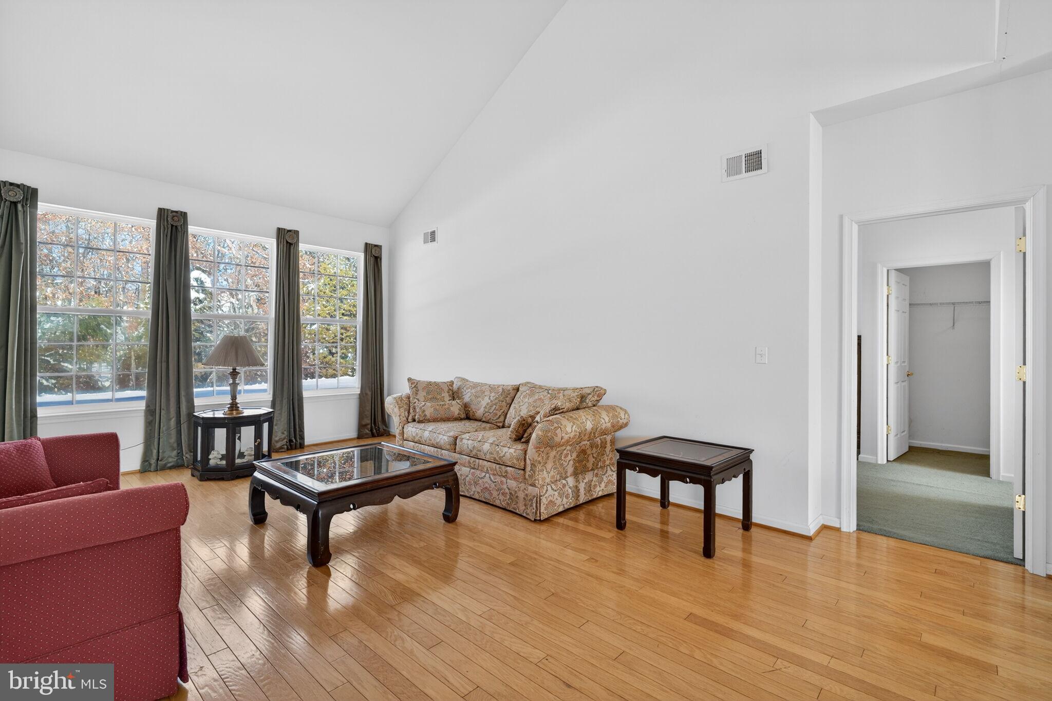 76 Portland Street Barnegat, NJ 08005 - Photo 14 of 47 a living room with furniture and a large window with wooden floor