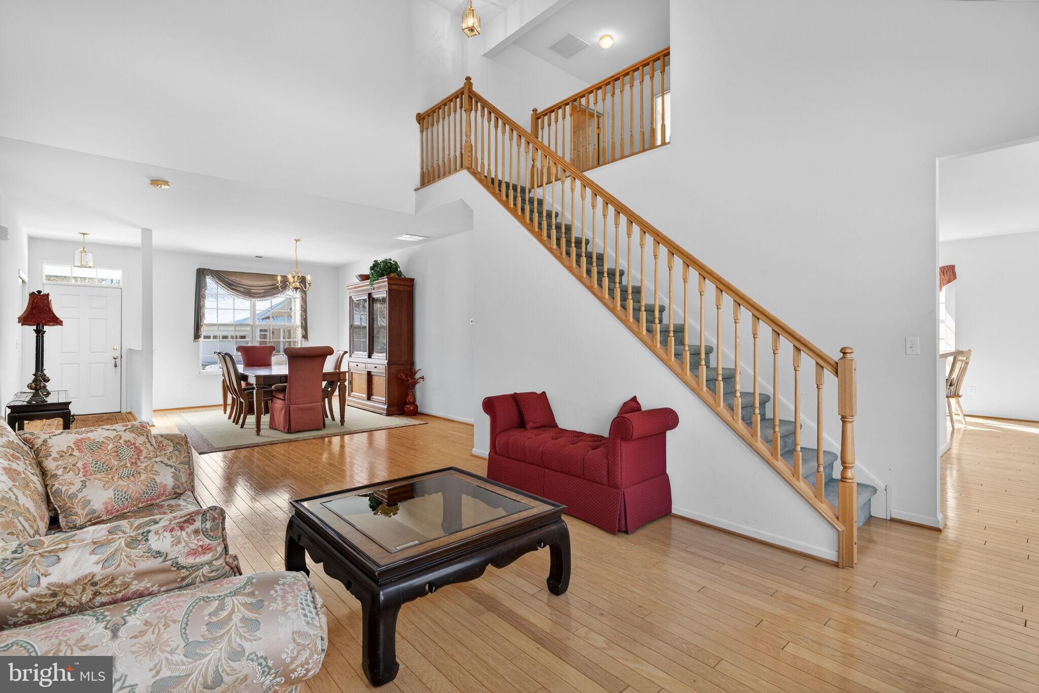 76 Portland Street Barnegat, NJ 08005 - Photo 15 of 47 a living room with furniture and a dining table
