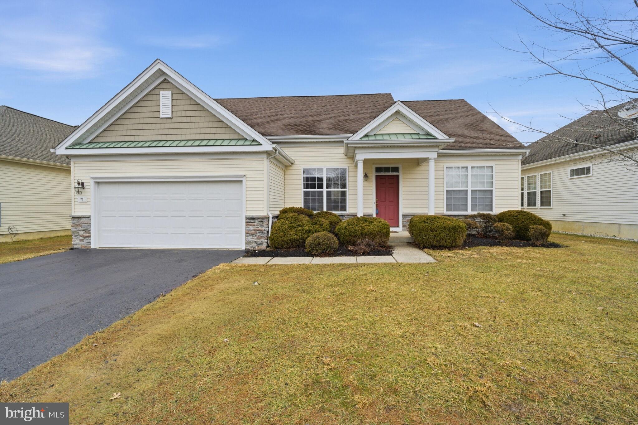 76 Portland Street Barnegat, NJ 08005 - Photo 2 of 47 a front view of a house with a yard