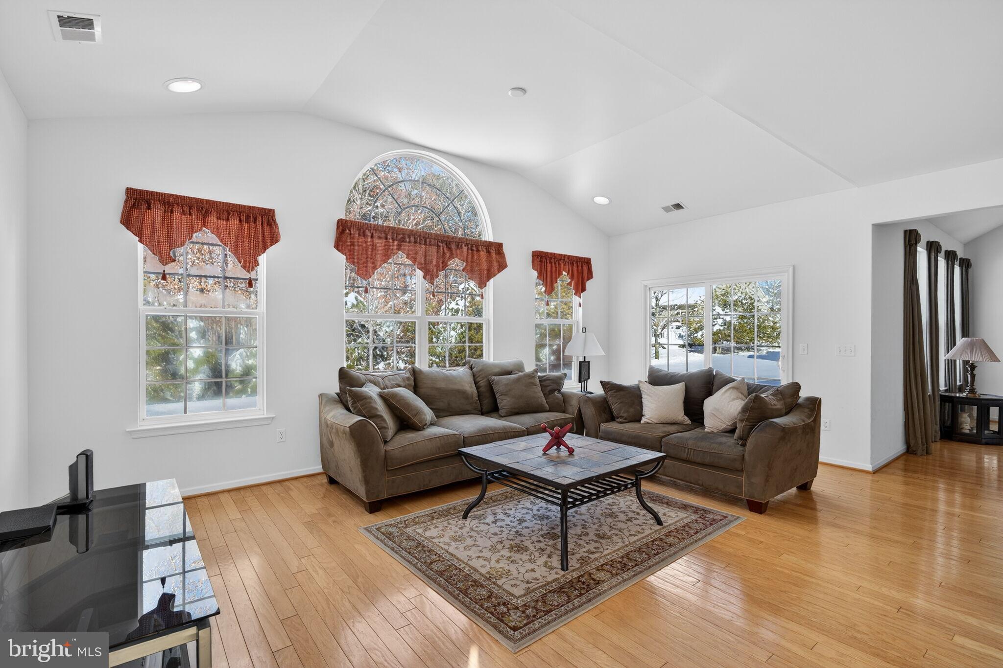 76 Portland Street Barnegat, NJ 08005 - Photo 24 of 47 a living room with fireplace furniture and a large window